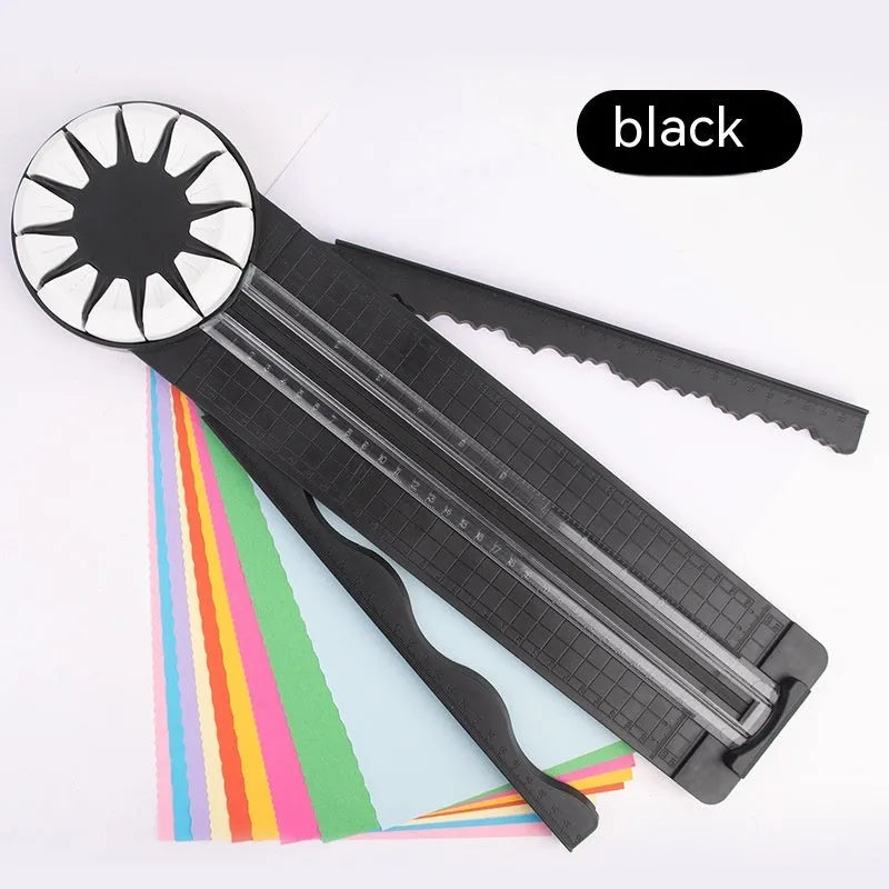 Plastic paper cutting machine with 12 multifunctional heads in pink colour on craft table