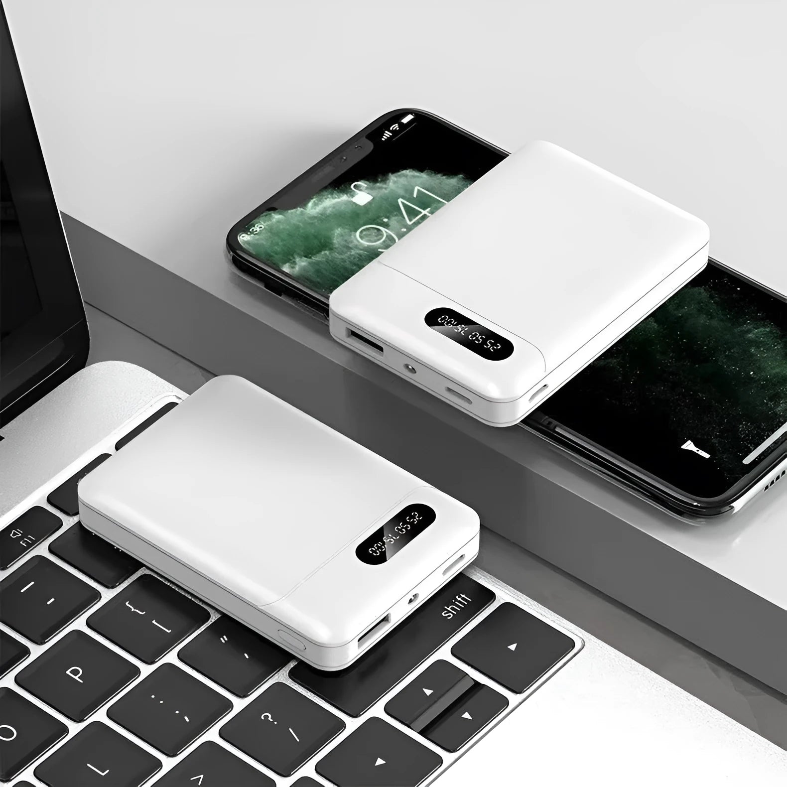 Black and white plastic power bank with USB ports and 10000mAh capacity