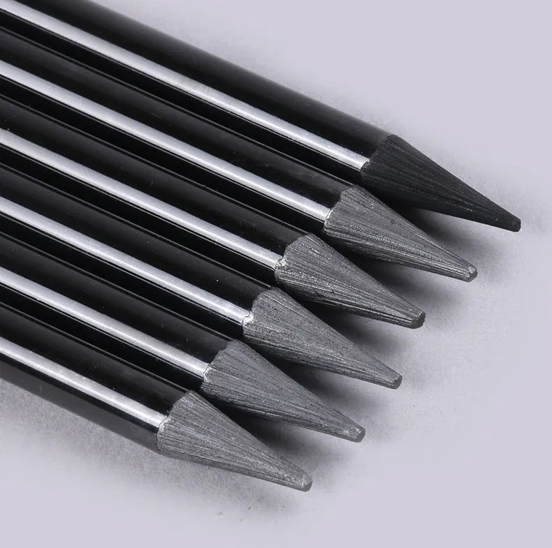 Carbonized Pencil Suit set showing graphite and carbonized pencils with wooden shells on a suction card.
