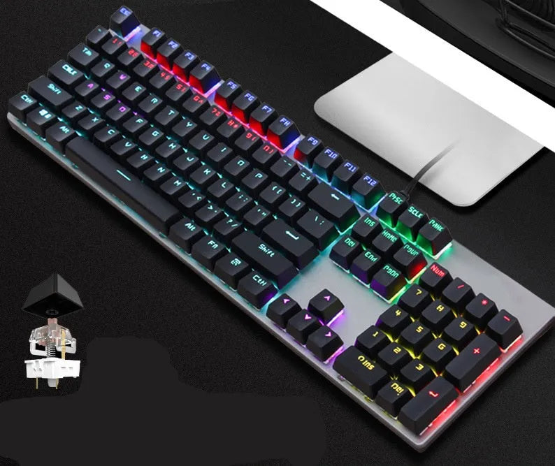 AOC GK410 mechanical keyboard with green switches, metal case, and backlit keys on a desk.