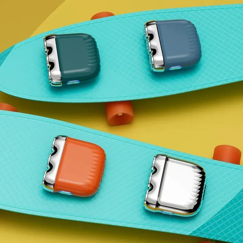 Mini electric shaver with three floating heads in gun colour, orange, green or blue finishes