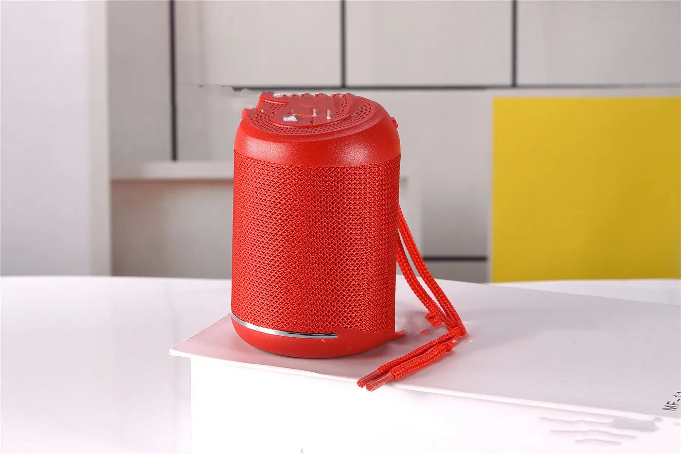 Portable outdoor Bluetooth subwoofer speaker shown in available colours: black, blue, camouflage, light blue, red, or silver.