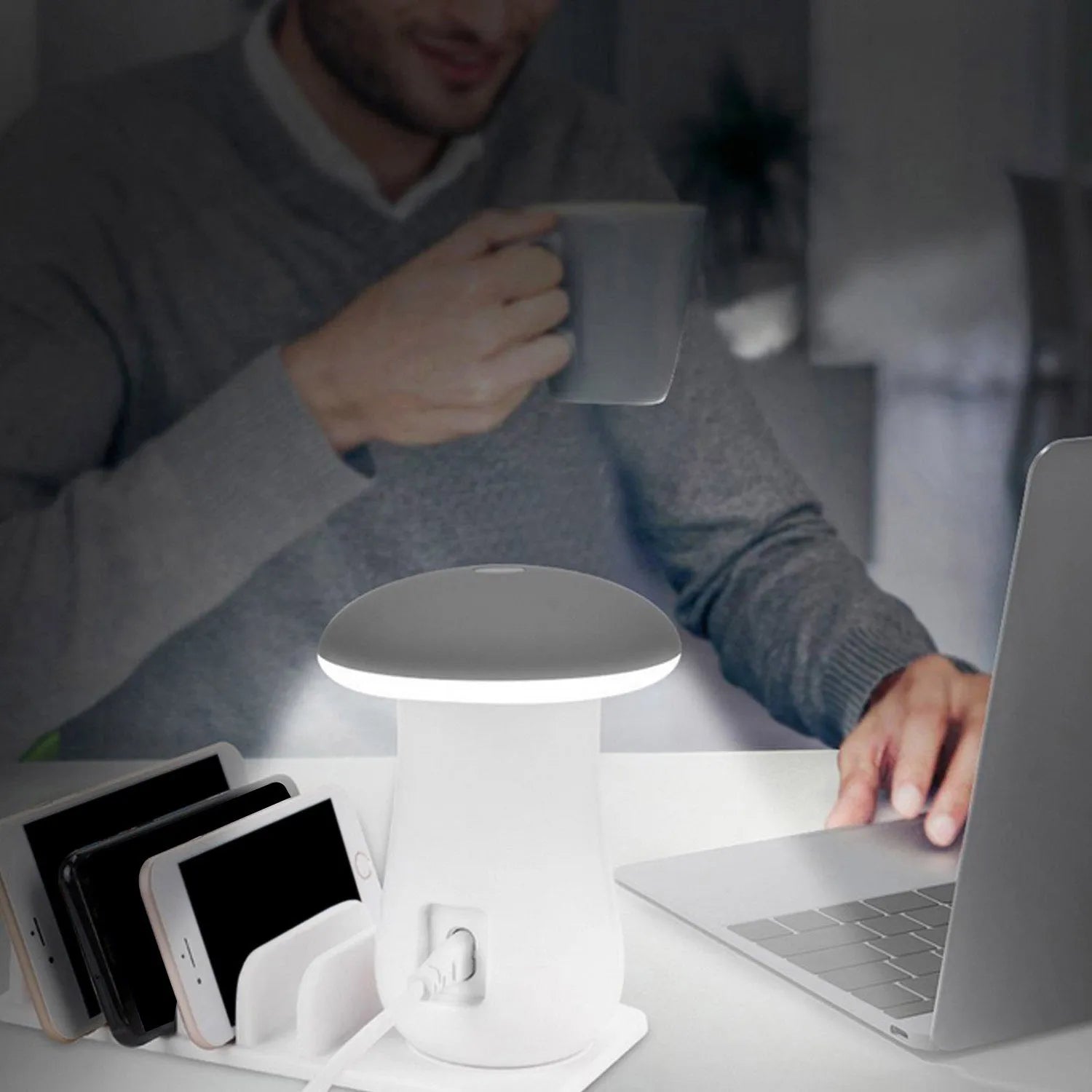 White mushroom-shaped LED desk lamp with a 5-port USB charging dock station at its base on a wooden table