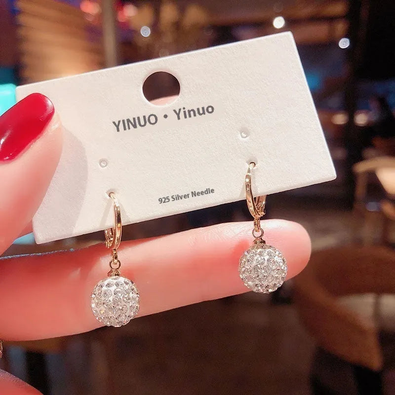 Geometric copper earrings with zircon stones in electroplated finish
