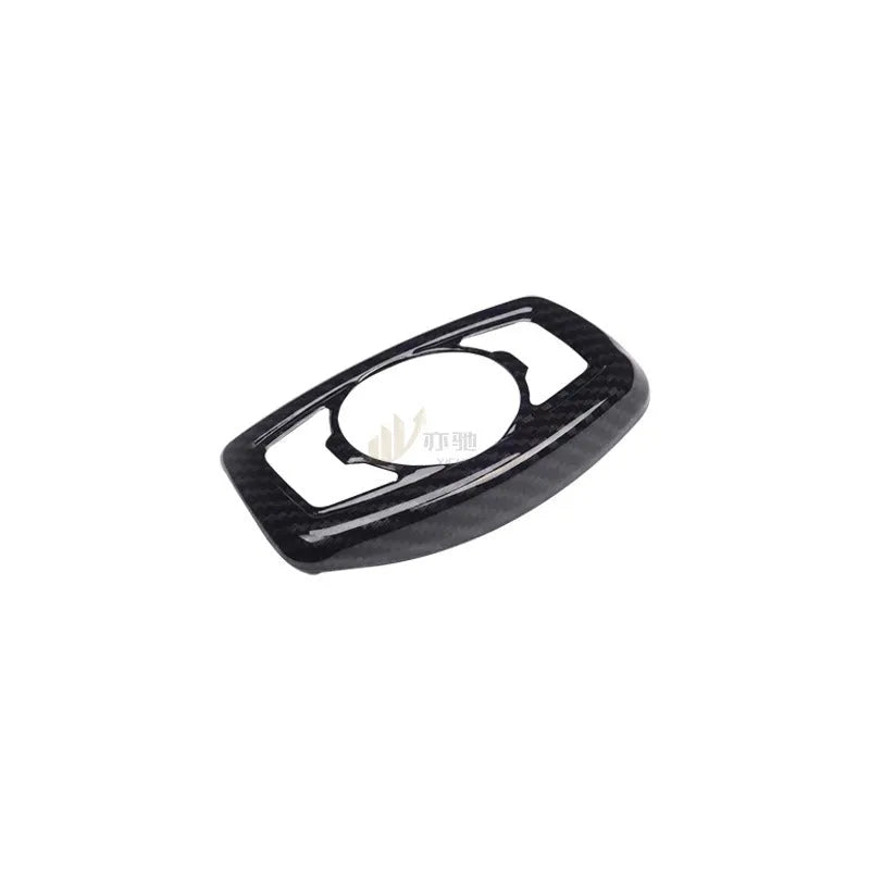 Carbon fibre patterned decorative paster for Ford F150 headlight control panel.