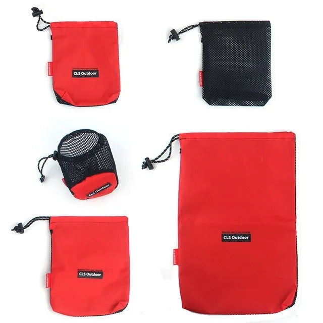 Set of five red Oxford cloth travel storage bags with zippered closures and multiple pockets