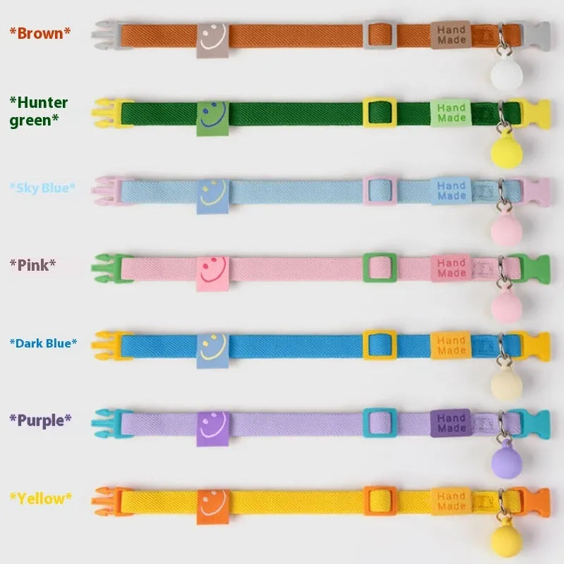 Small high elasticity polyester dog collar shown in one of seven solid colours, adjusted for a 22-32cm neck.