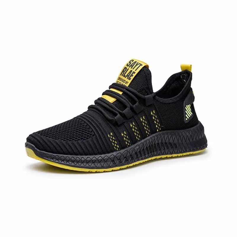 Men's black casual low-top trainers with flying weave upper, cross straps, and a striped pattern.