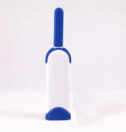 Blue reusable pet hair removal comb with a double-sided sticky brush and self-cleaning base.