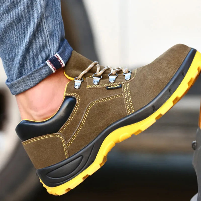 Bronze cowhide leather low-cut safety boots with a steel toe cap and solid rubber tread sole.