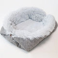 Grey and white long plush pet bed with black non-slip bottom particles