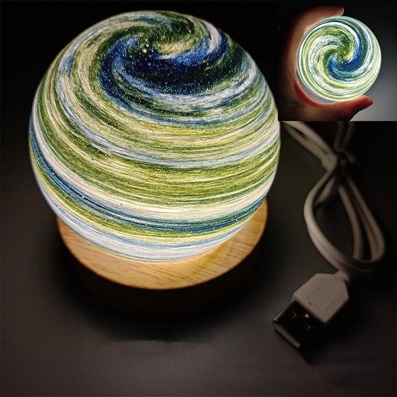 Planet-themed night light with USB cable and base, showing 80mm diameter globe