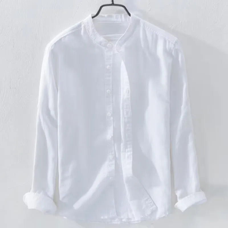 Loose fit long sleeve cotton linen shirt in solid dark blue colour displayed flat showing casual style