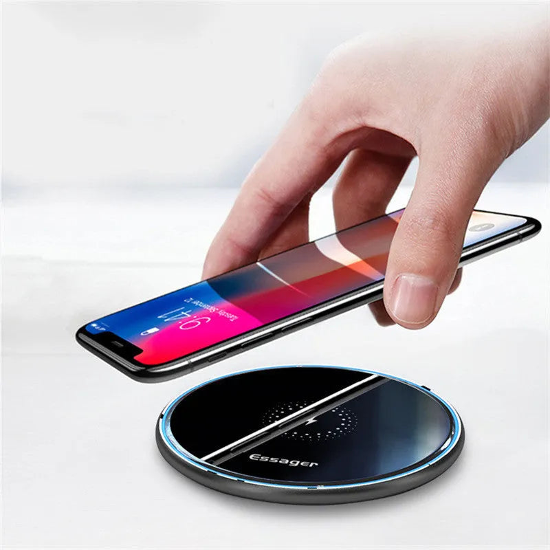 Black or white aluminium alloy 15W fast wireless charging pad on a desk