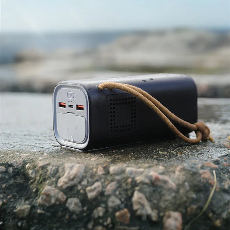 Black portable power bank with solar panel, showing dimensions of 70mm by 70mm by 162mm.