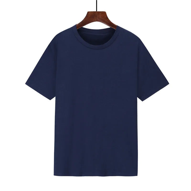 Man wearing a black loose-fit cotton T-shirt, short sleeves, crew neck.