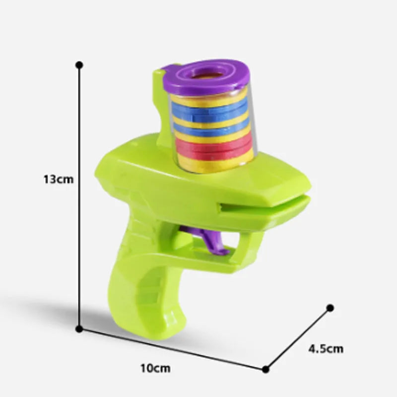Green interactive cat toy launcher with foam disc for indoor pet play