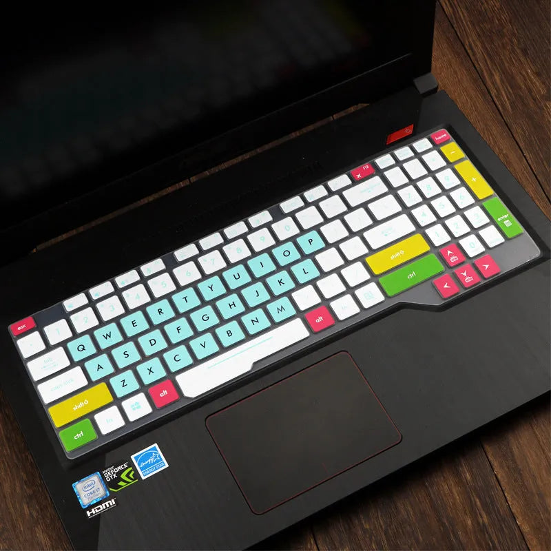 ASUS Flight laptop keyboard protective film cover in multiple colour options on a laptop.