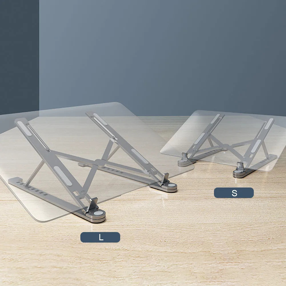Aluminium laptop stand in silver colour, folded flat next to an open laptop for size comparison.