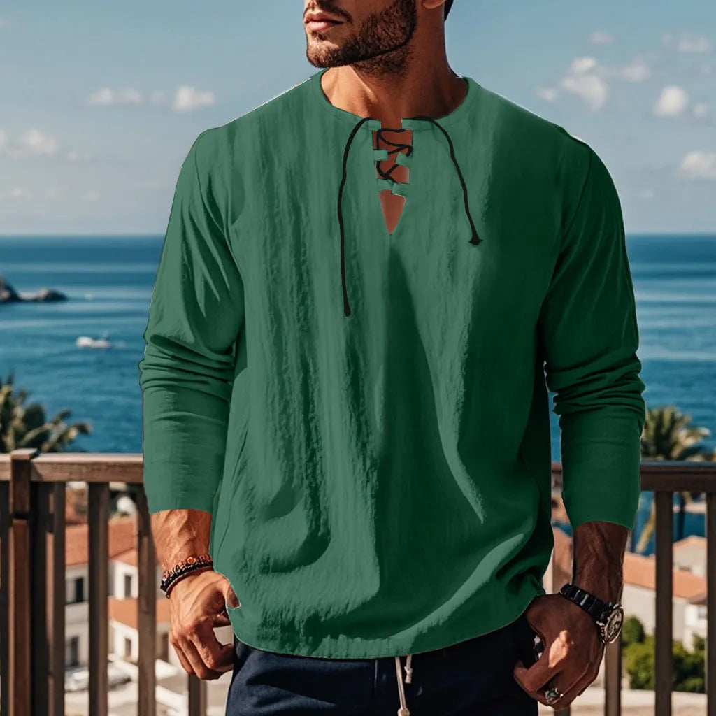 A man wearing a loose-fit solid colour cotton linen blend casual shirt.