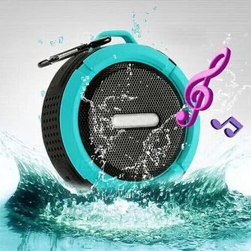 Portable waterproof Bluetooth speaker in five colours with bag clip and TF card slot