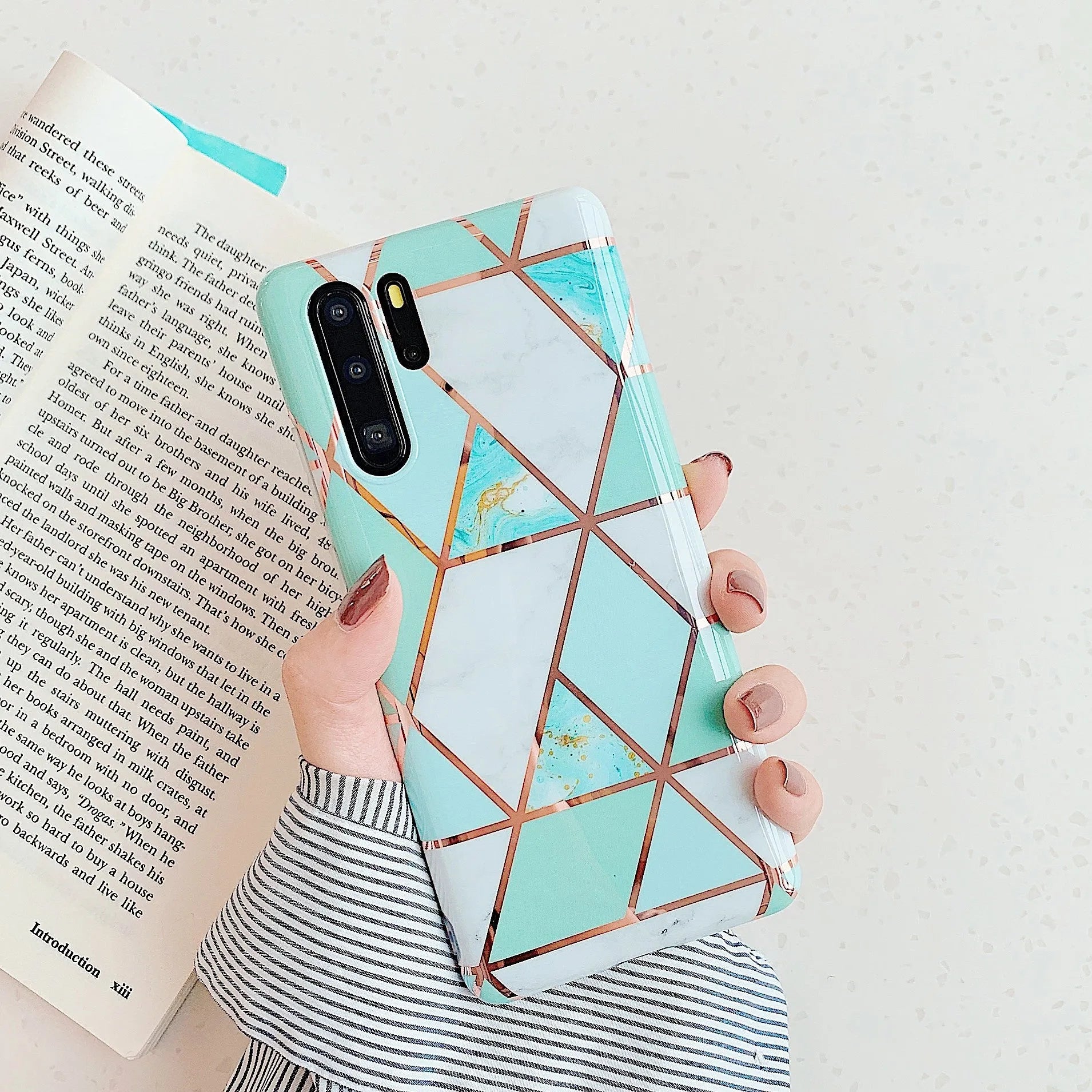 Electroplated marble pattern mobile phone case showing multiple colour options for Huawei and Samsung smartphones