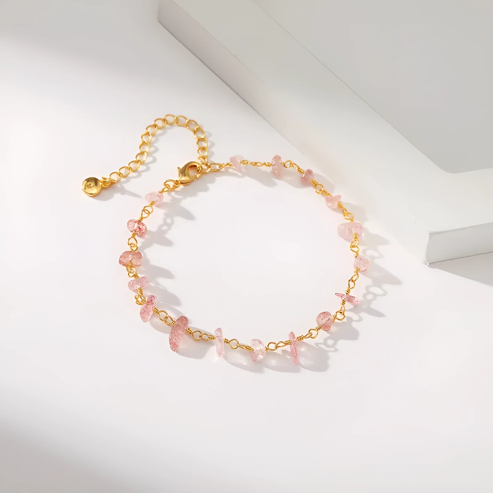 Geometric women's bracelet with irregular natural gravel turquoise stones and crystal accents on 18K copper