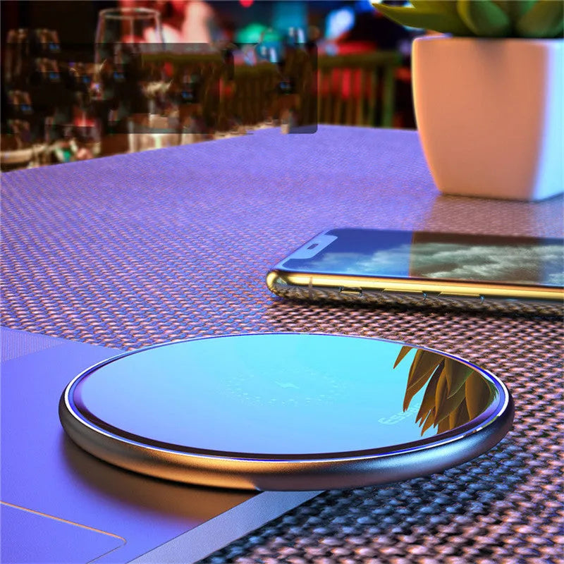 Black or white aluminium alloy 15W fast wireless charging pad on a desk