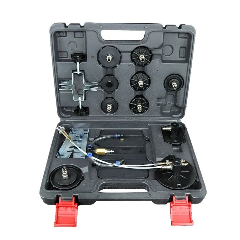 Pneumatic brake fluid bleeding machine with pressure gauge, regulator, and clear drain hose on a workshop bench