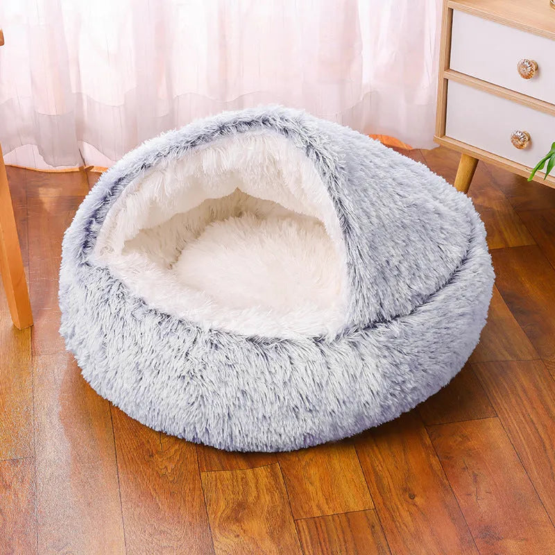 Semi-surrounded waterproof cloth dog kennel in a gradient colour, shown in a garden setting.