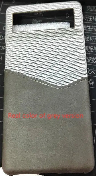 Black leather Google Pixel phone case back cover on a table.