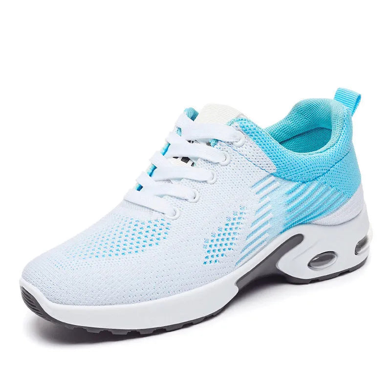 Women's Flyknit casual running shoes in striped pattern with lace-up front, shown in pink colour.