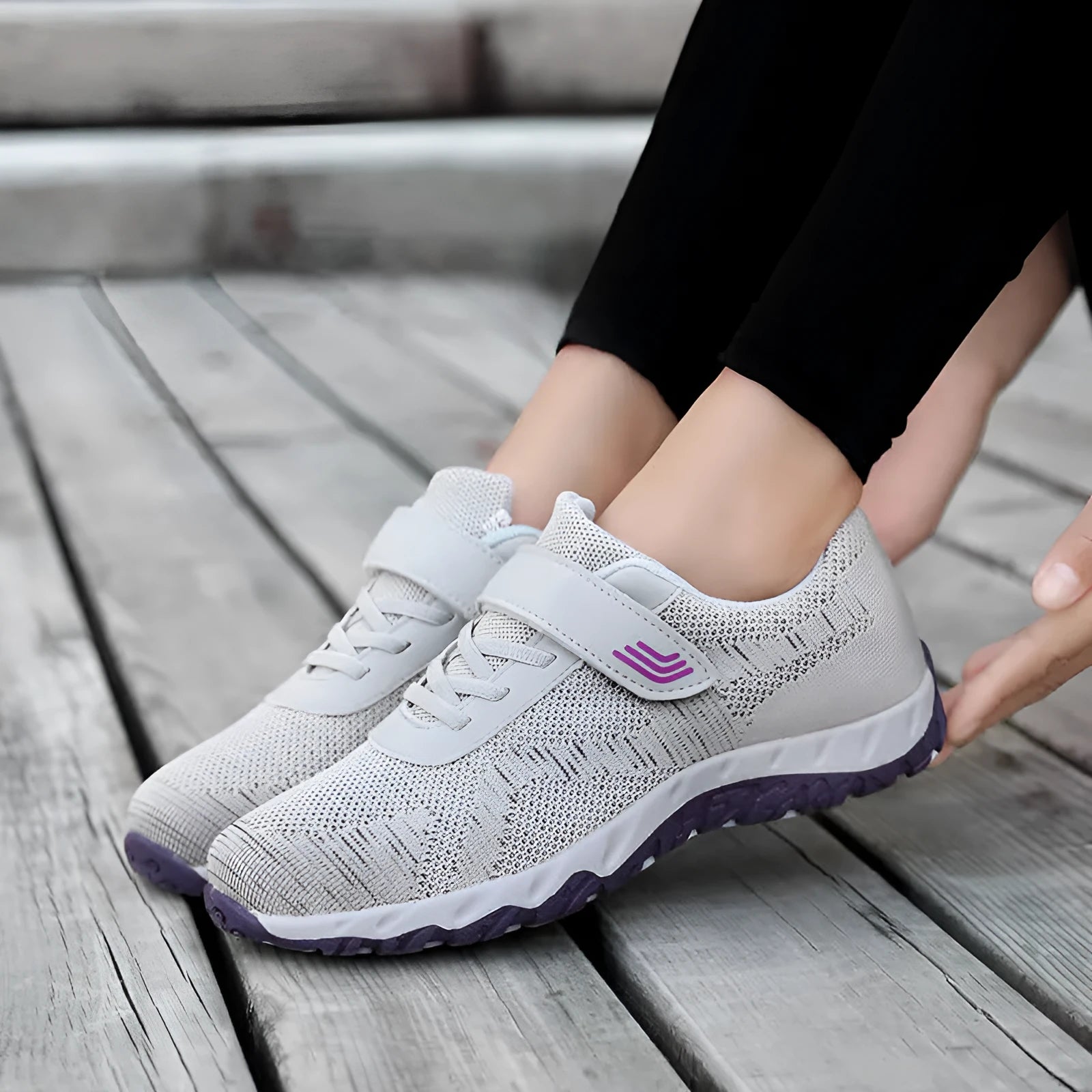 Women's low-top wedge sneaker in grey purple with mesh upper and Velcro strap.