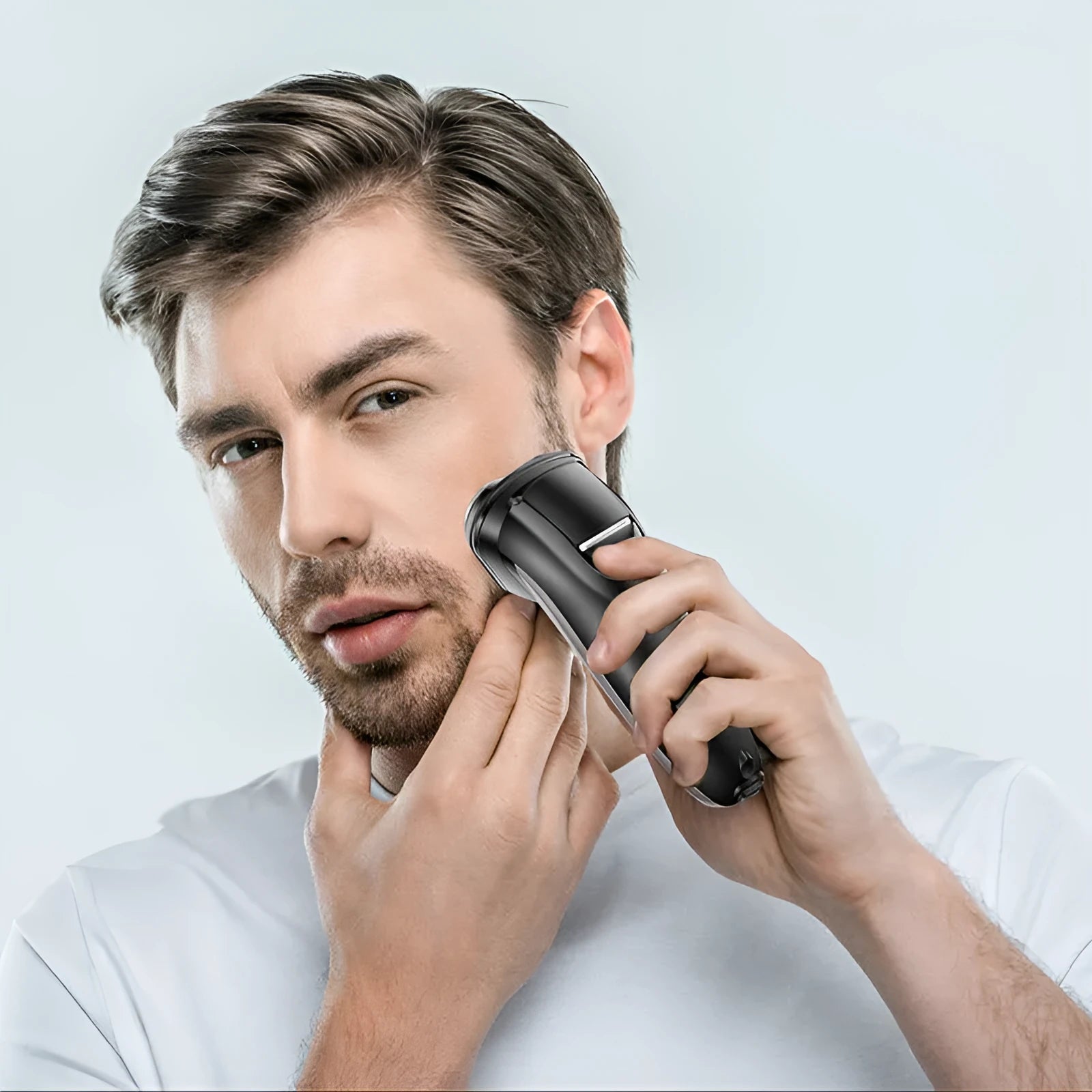 Electric shaver with three floating cutter heads, pop-up sideburn trimmer and LED display