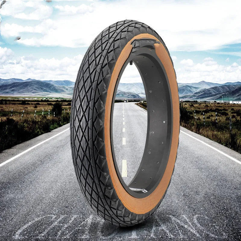 Brown rubber tyre for snowmobiles and electric beach cars measuring 20x4.0 inches
