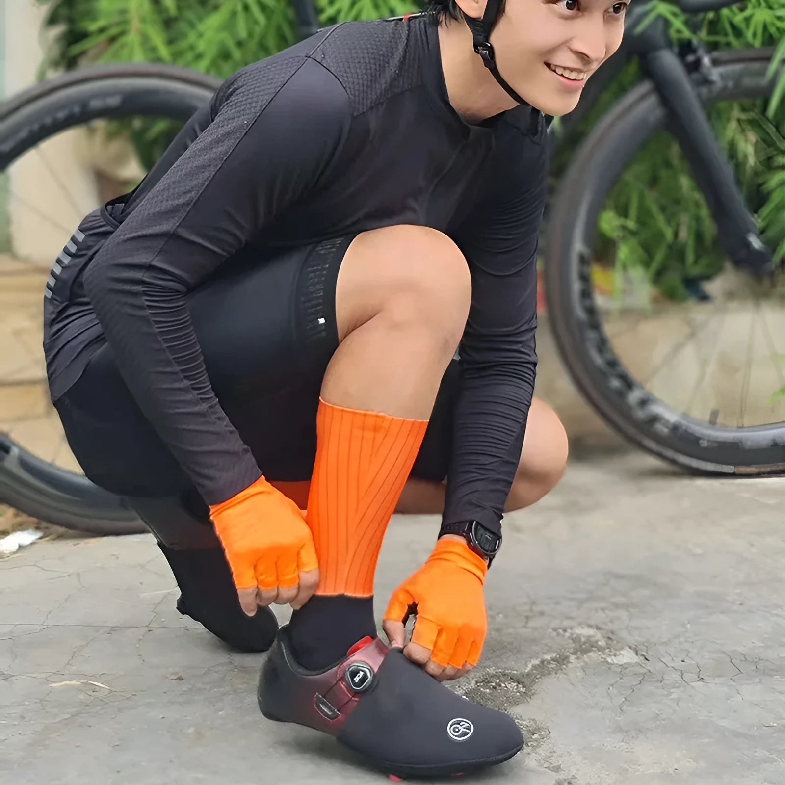 Cycling socks in orange, black, purple, white, grey, or dark blue with moisture-wicking fabric