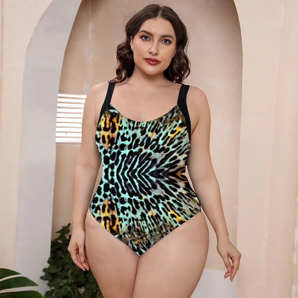 Women's vest style one-piece floral print swimsuit with spaghetti straps on a mannequin.