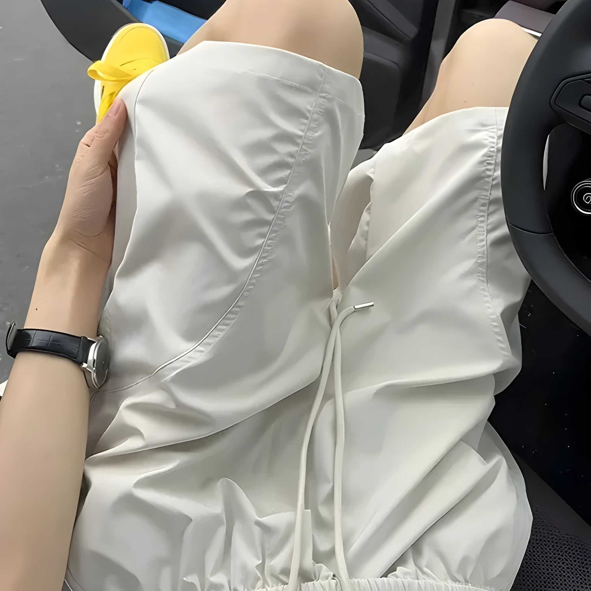 Men's quick-drying sports shorts in polyester with elastic waistband, shown in creamy-white colour