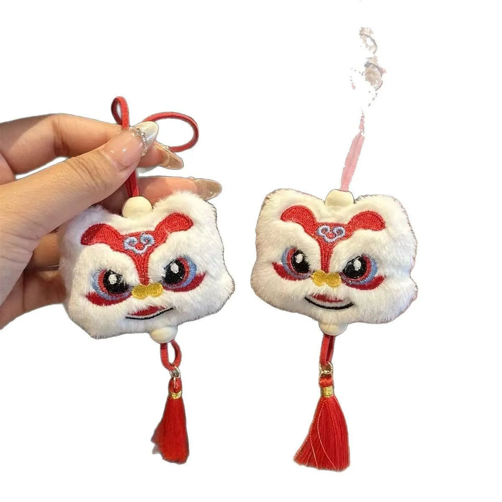Handmade Chinese style plush lion tassel keychain ornament with star stone detail in blue colour