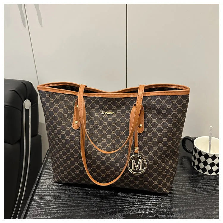 Western style black PU leather shoulder bag with sewing thread details and structured design