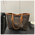 Western style black PU leather shoulder bag with sewing thread details and structured design