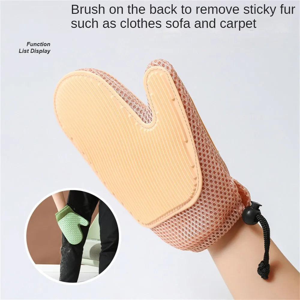 Dark blue mesh and TPR pet grooming glove for removing dog and cat hair from fur and fabrics.