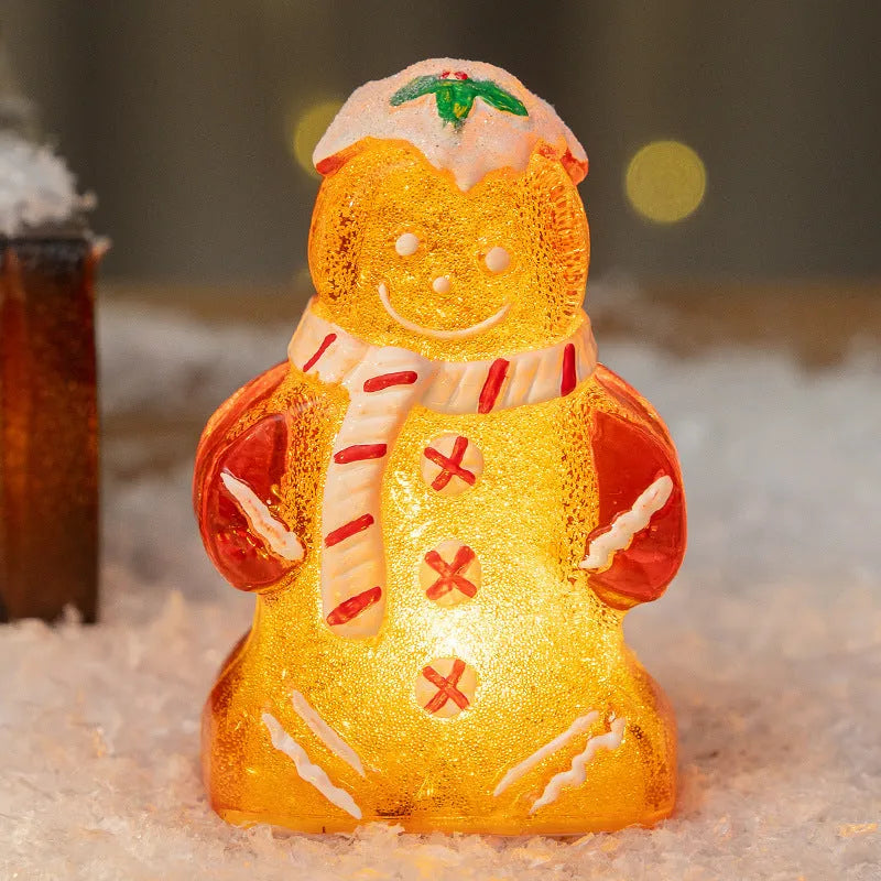 Glowing plastic gingerbread man Christmas ornament with a scarf in red, white, or transparent colours.