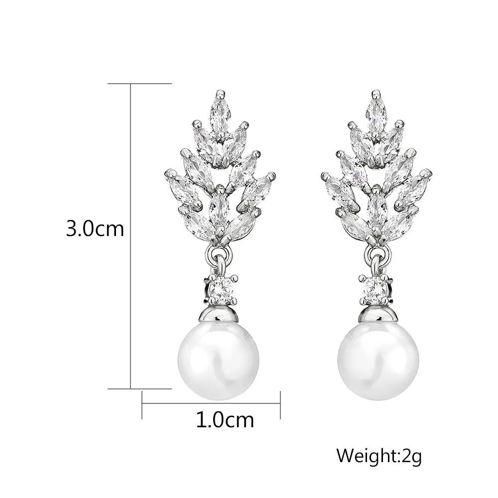 Geometric flower earrings with micro inlaid zircon and pearl detailing in gold plating