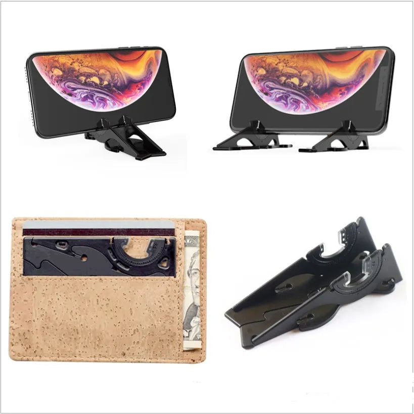 Black plastic card-type mobile phone holder on a wooden desk