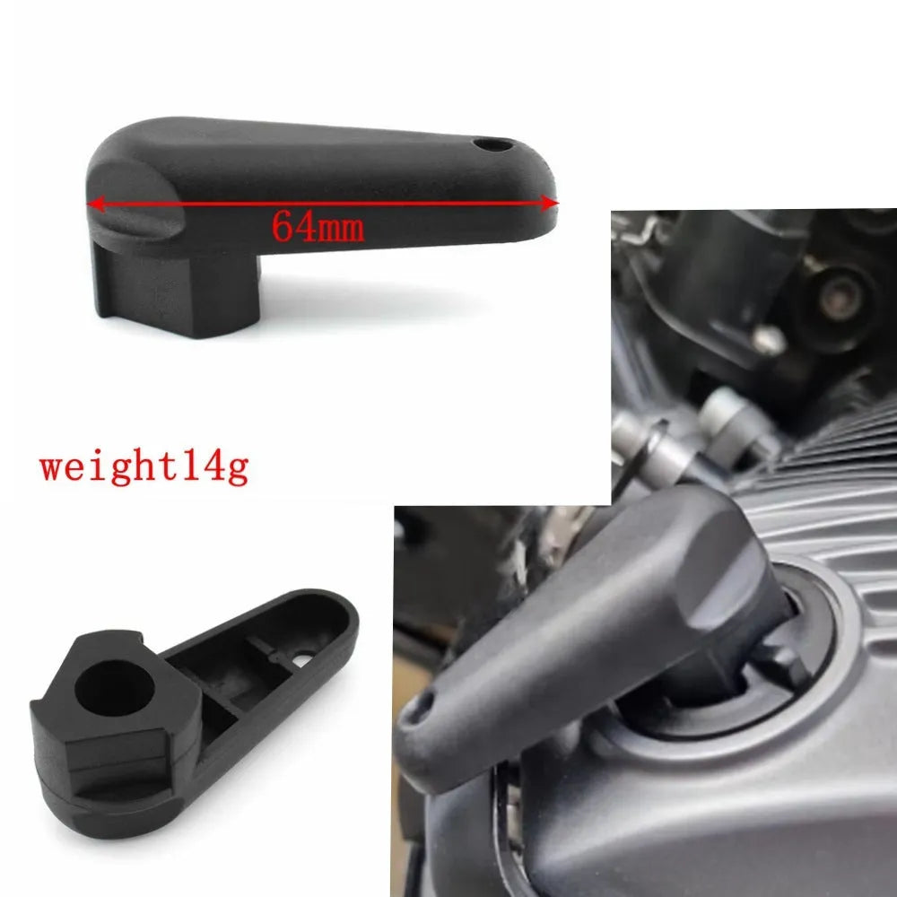 Black nylon quick-release wrench for BMW motorcycle oil cap on a 2004+ R model.