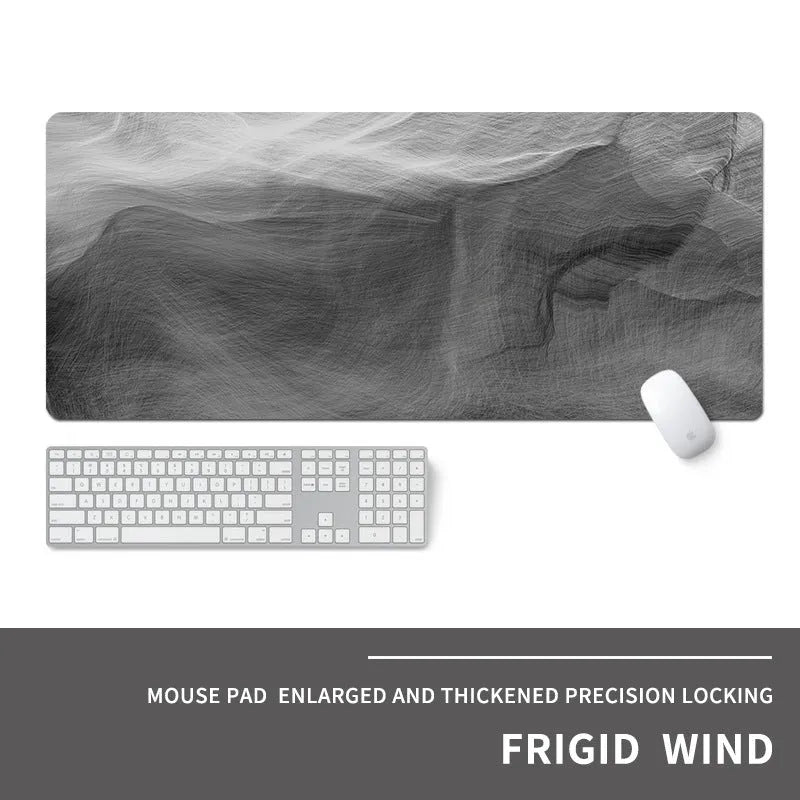 Oversized natural rubber gaming desk mat with graphical print, showing keyboard and mouse placement.