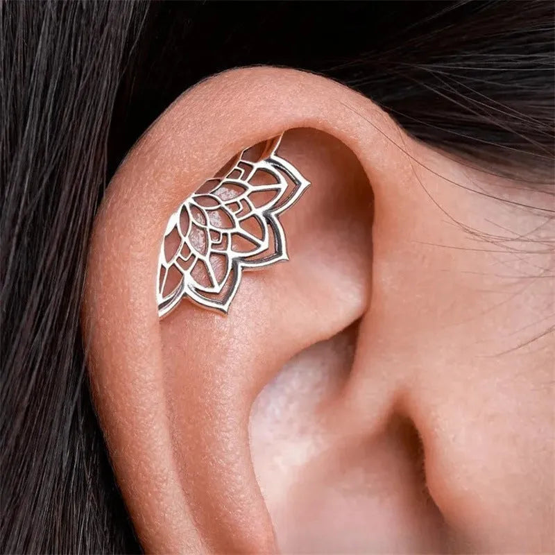 Metal spider web stud earrings with geometric mesh design in gold and silver electroplated finishes