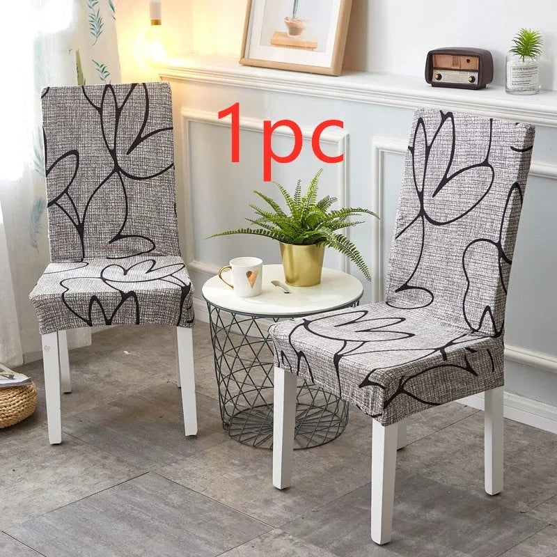 A stretchy spandex chair cover fitted neatly on a four-legged wooden dining chair.