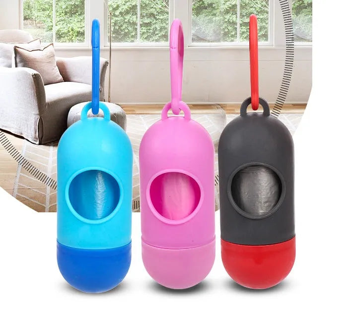 Roll of biodegradable dog poop bags showing multiple colour options including black, blue, green, and pink.
